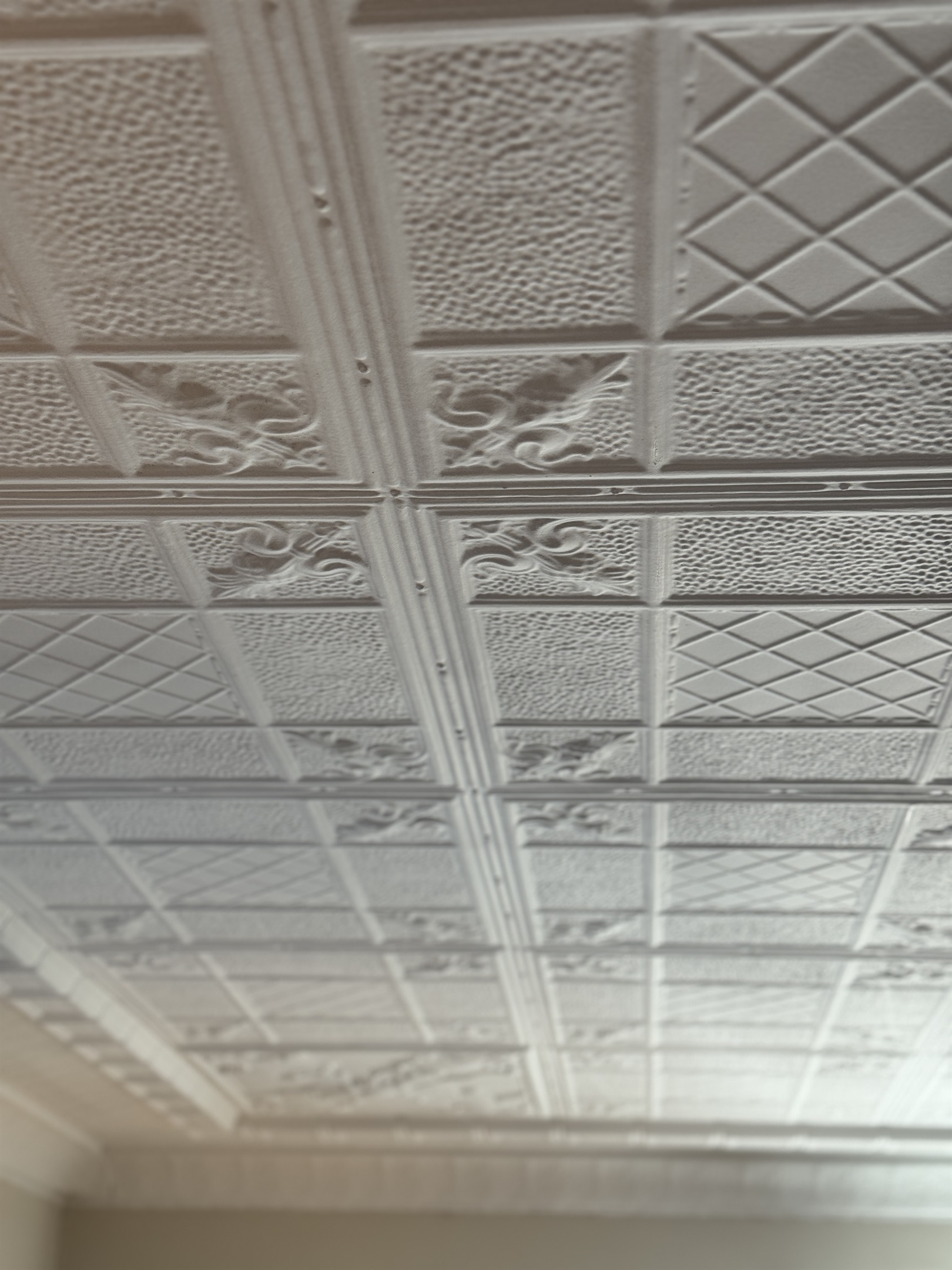 Cooperstown Cottage amazing original details still intact are evident in tin ceilings.