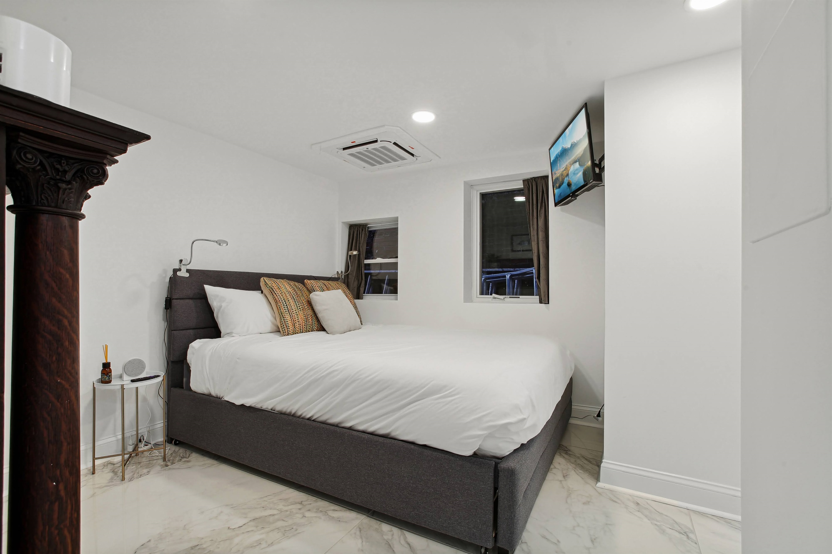 Bedroom #8 on the lower level has a queen bed with a twin trundle underneath, and an en-suite bathroom