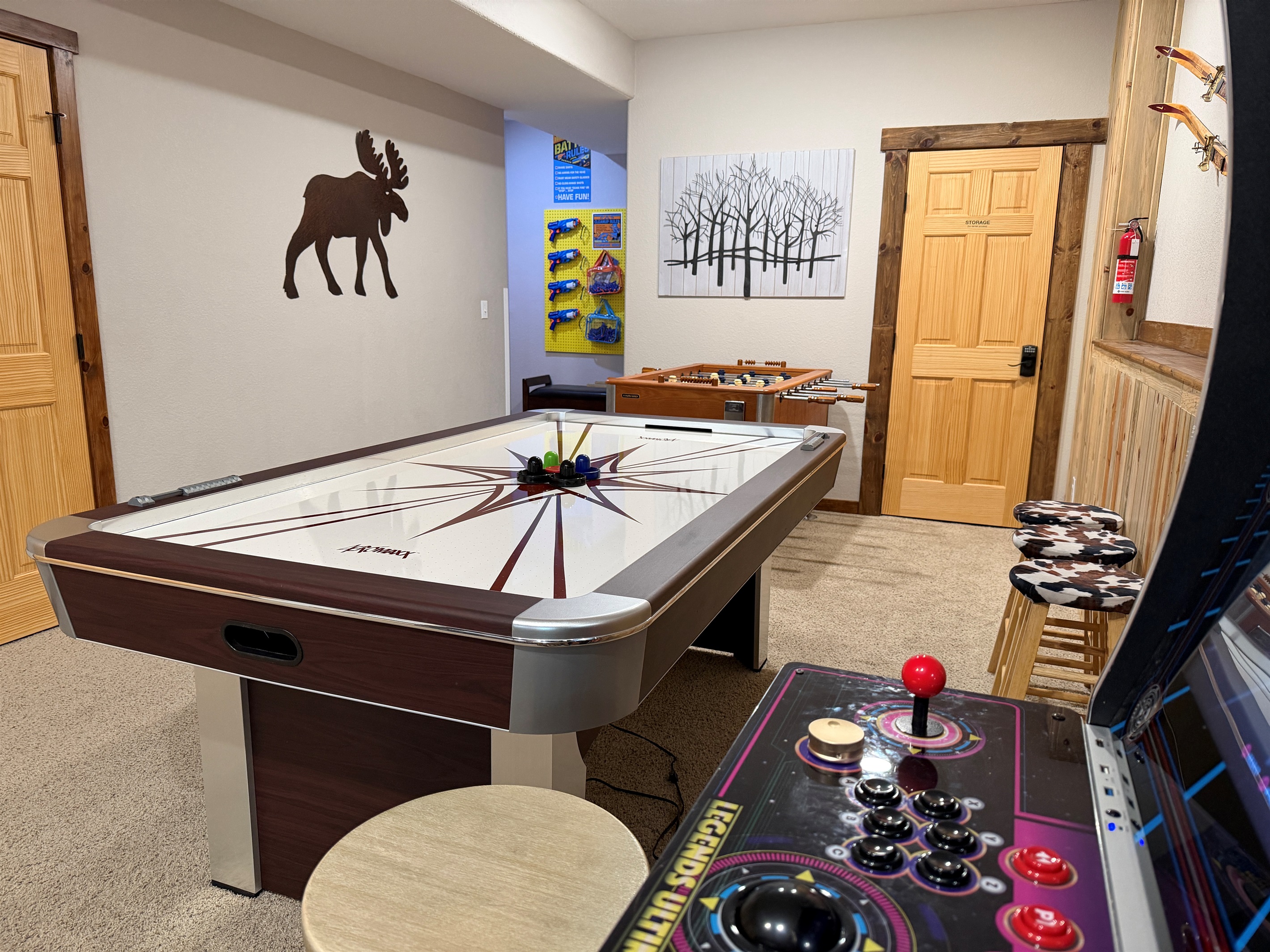 Endless fun awaits in our game room featuring air hockey, foosball, and a classic arcade! Perfect for family game nights.