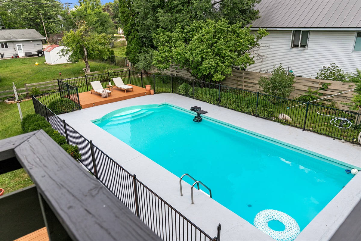From the upper deck, enjoy beautiful views overlooking the pool — the perfect spot to relax, unwind, and take in the scene.