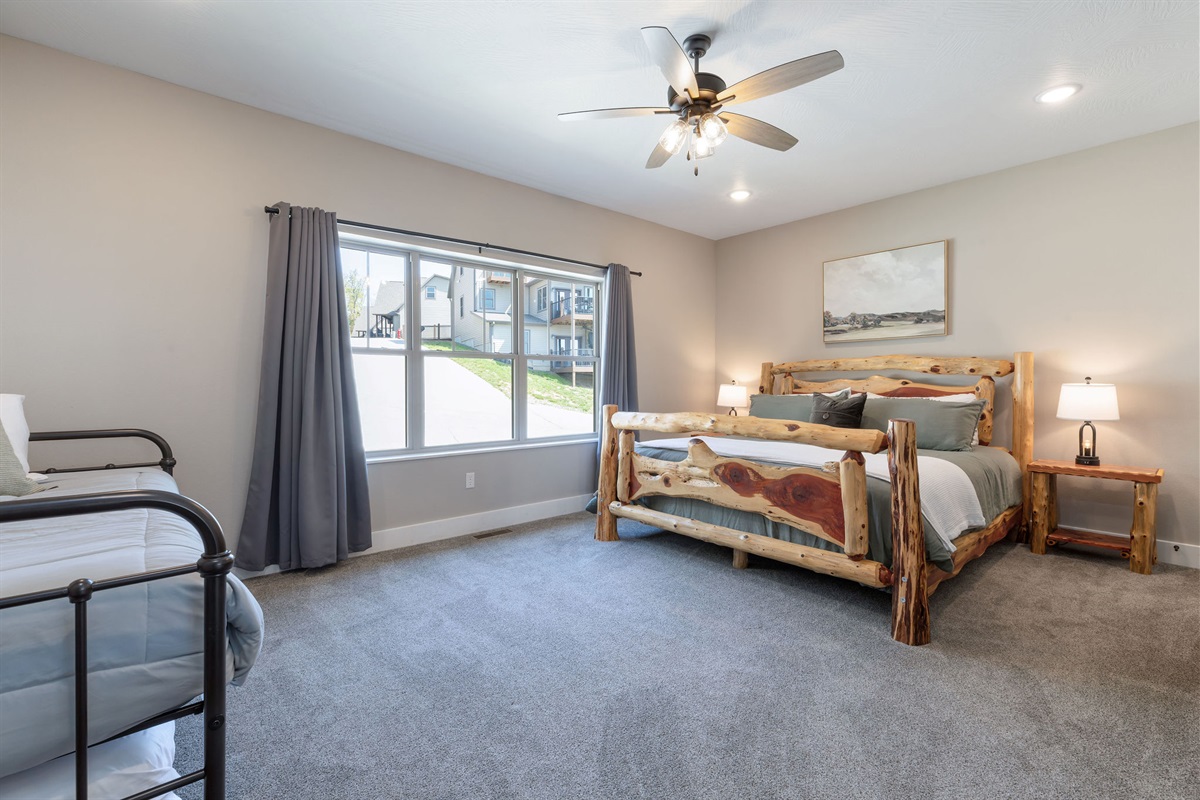 Main level King bedroom #3 w/ ensuite and trundle bed