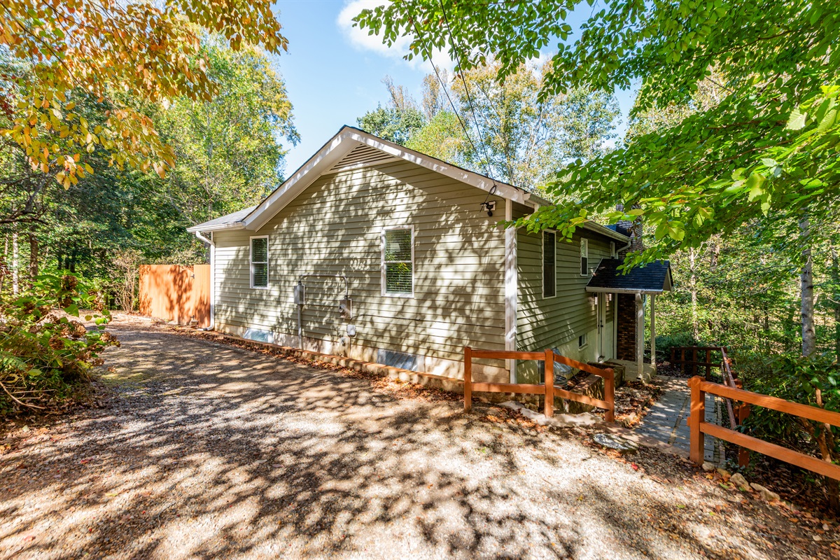 Exterior: Lush surroundings and inviting entryway await your nature-filled getaway!