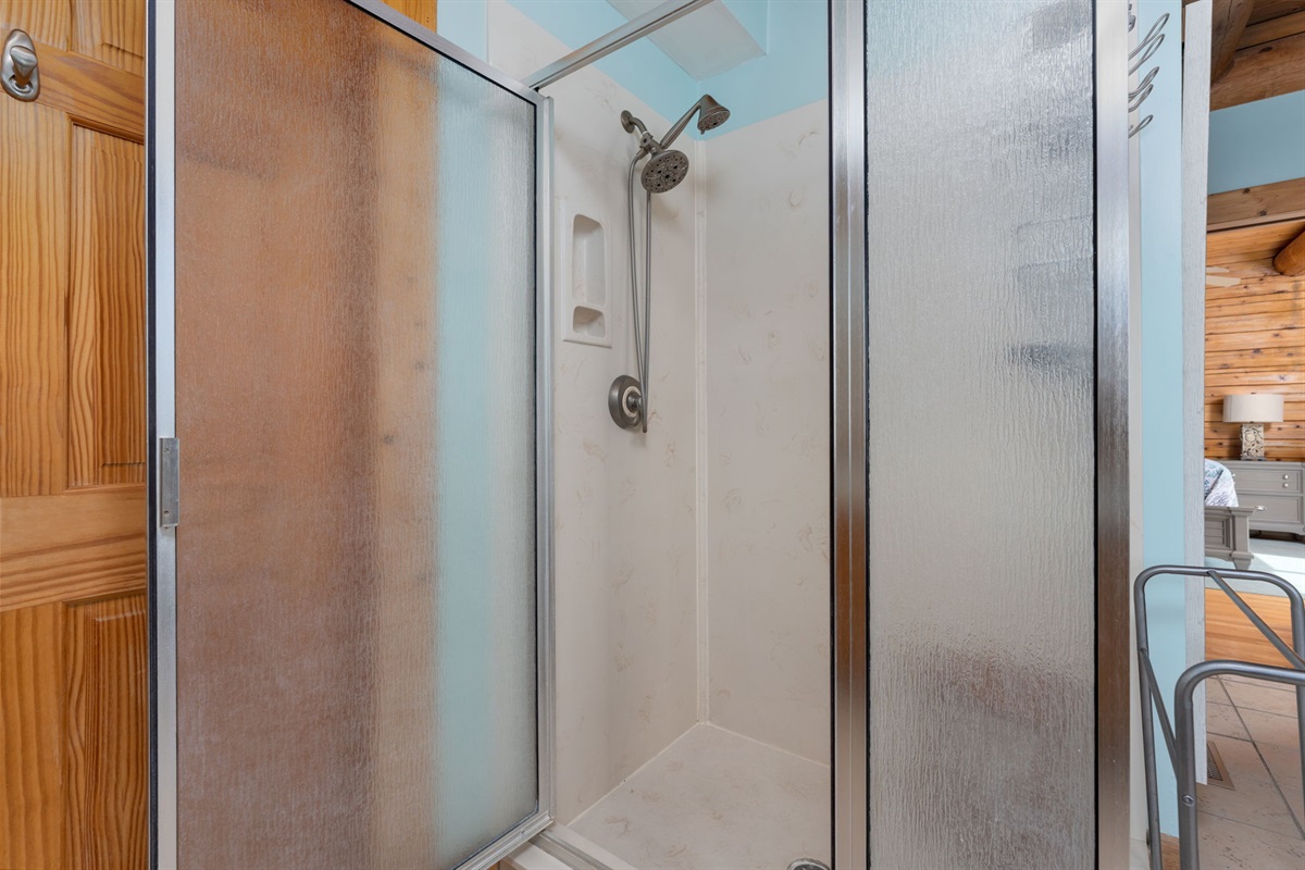 Frosted glass shower in the master bathroom