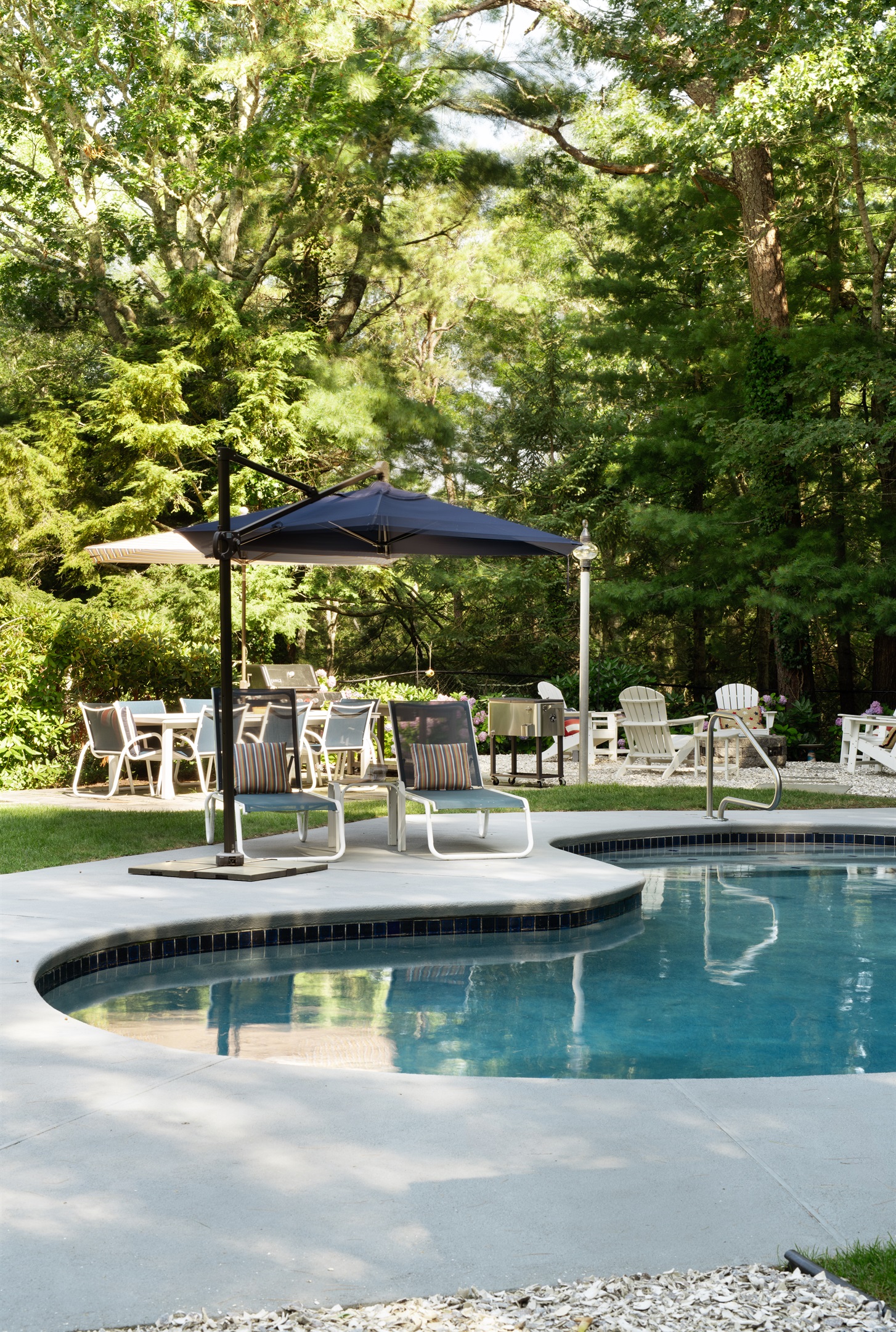 Enjoy the pool area with ample outdoor seats for friends and family.