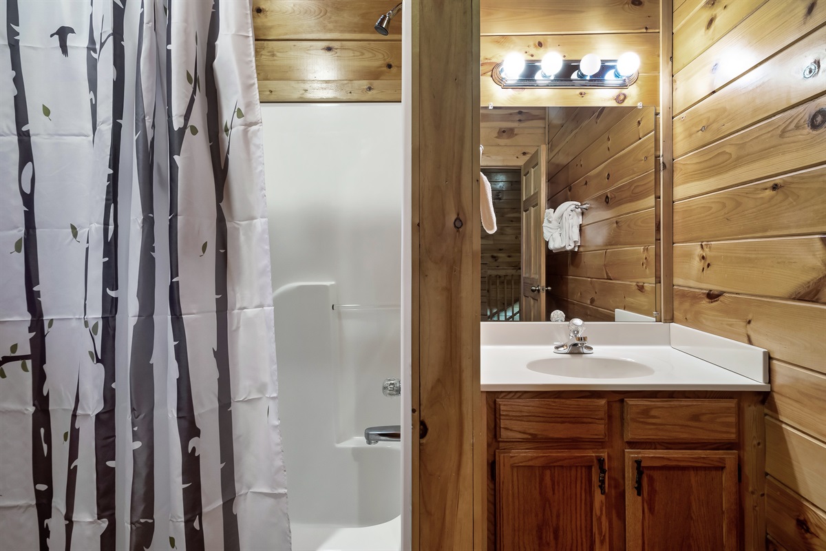 Freshen up comfortably in a full bathroom with a walk in shower designed for everyday ease.