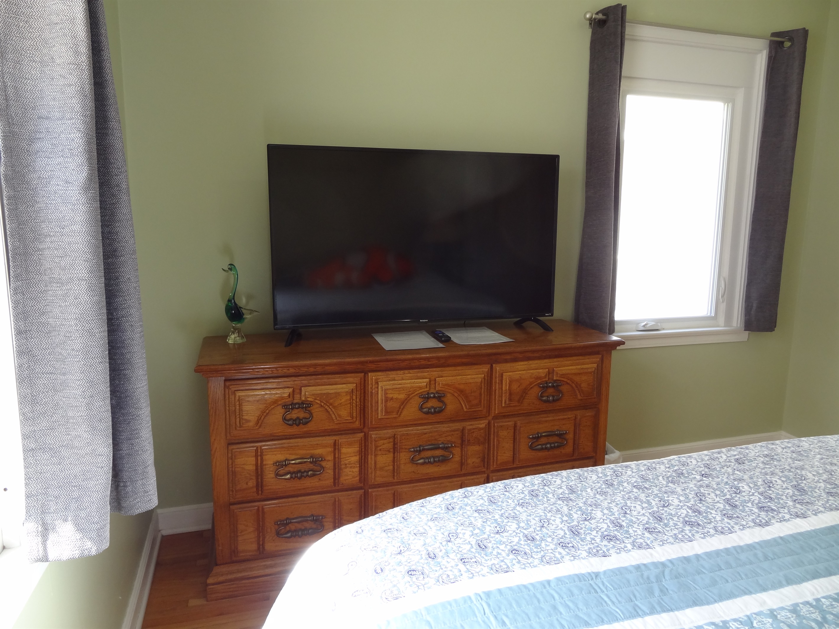 2nd bedroom with queen bed and Roku smart TV