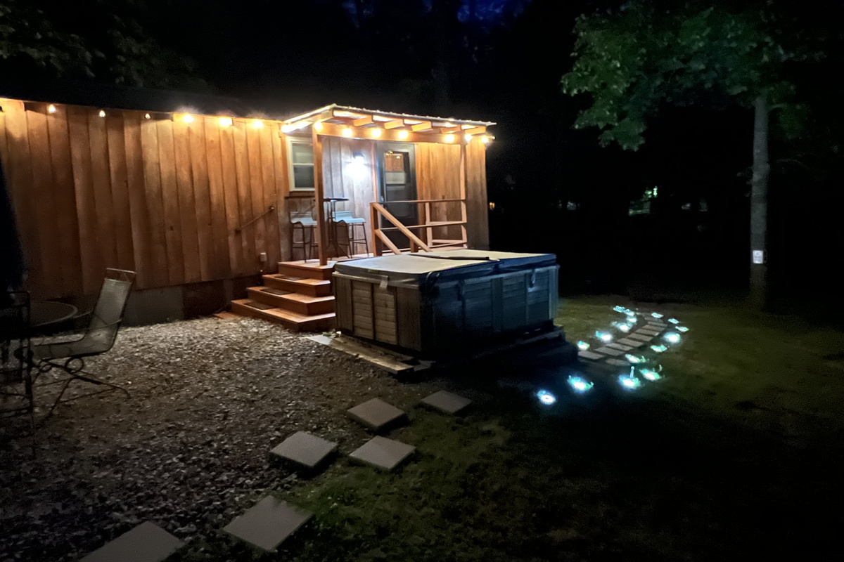 The tiny cabin shines after dark!