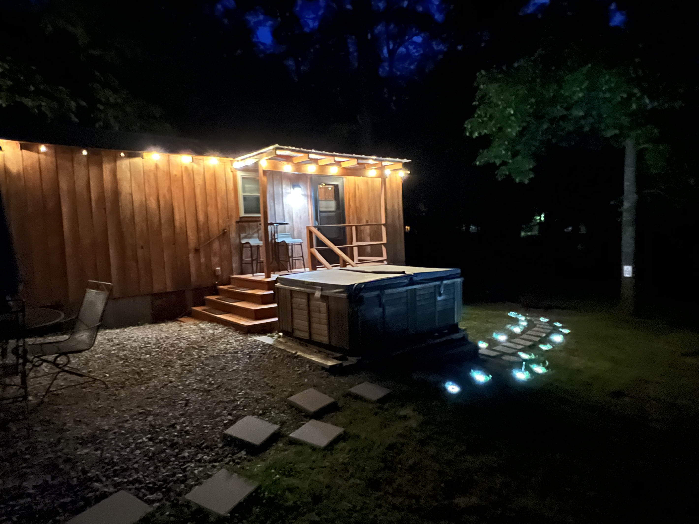The tiny cabin shines after dark!