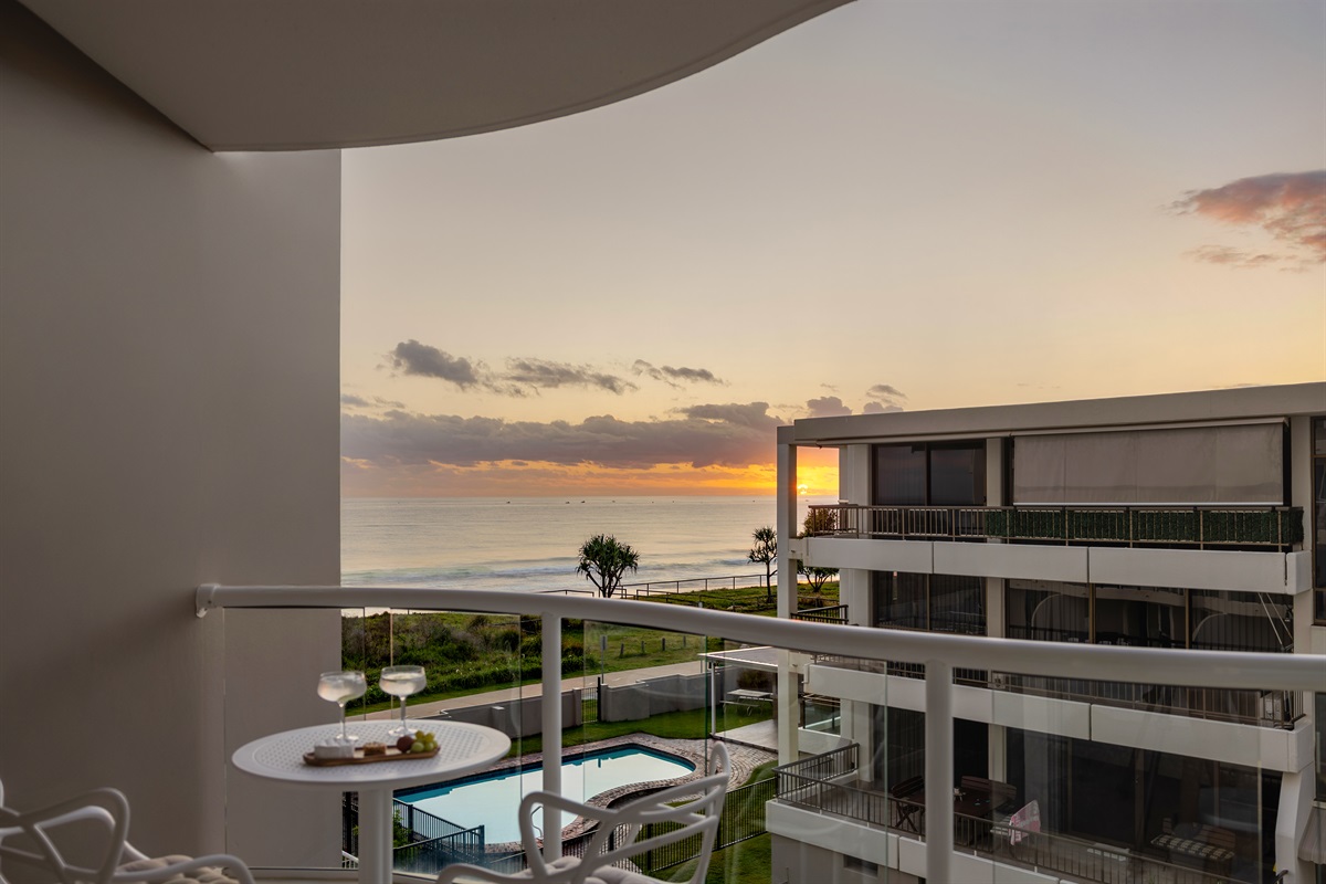 Private balcony with uninterrupted ocean views.