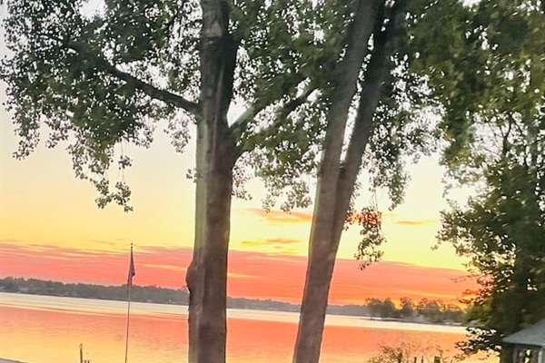Spectacular Paw Paw Lake sunset viewed from the property.