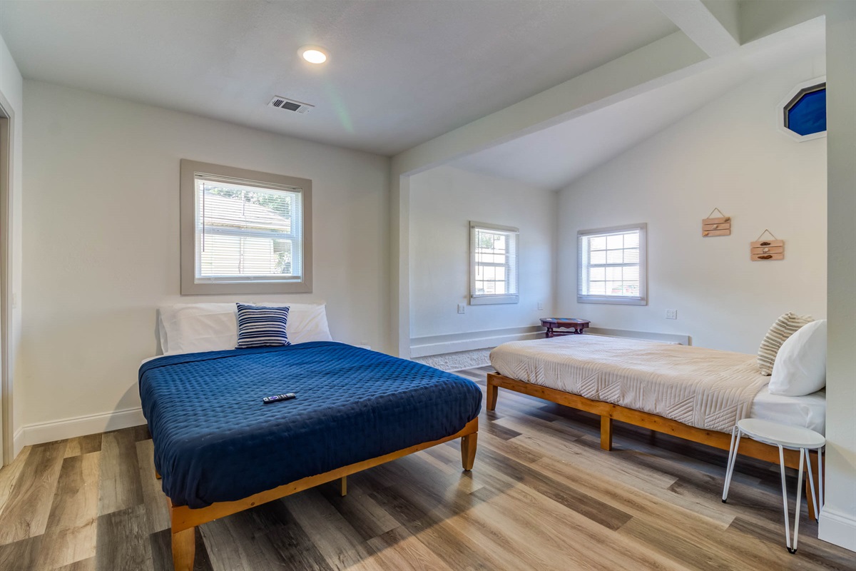 Secondary bedroom w/ two queens 