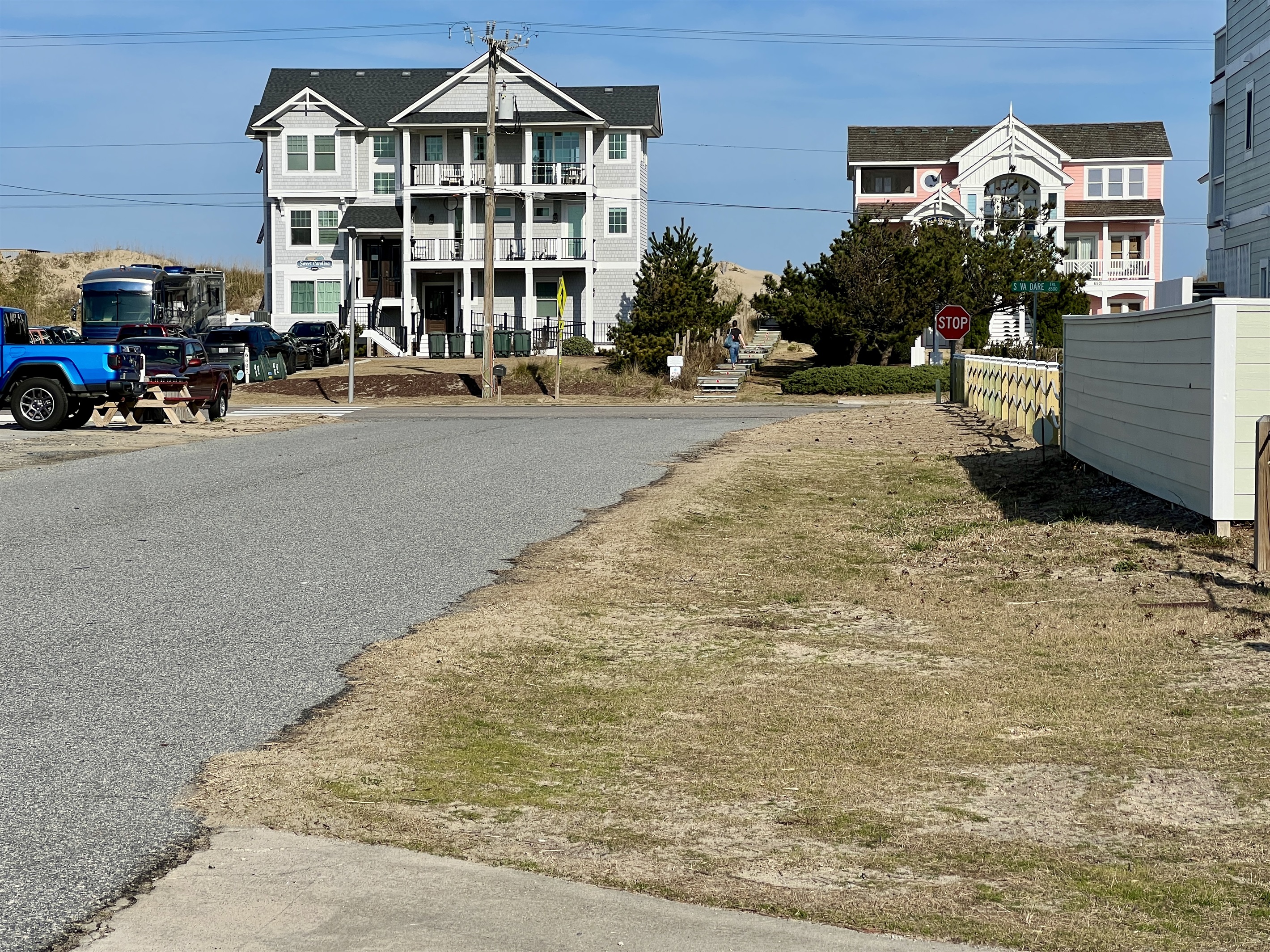The view from the driveway to the private beach access! The beach is about 100 yards away