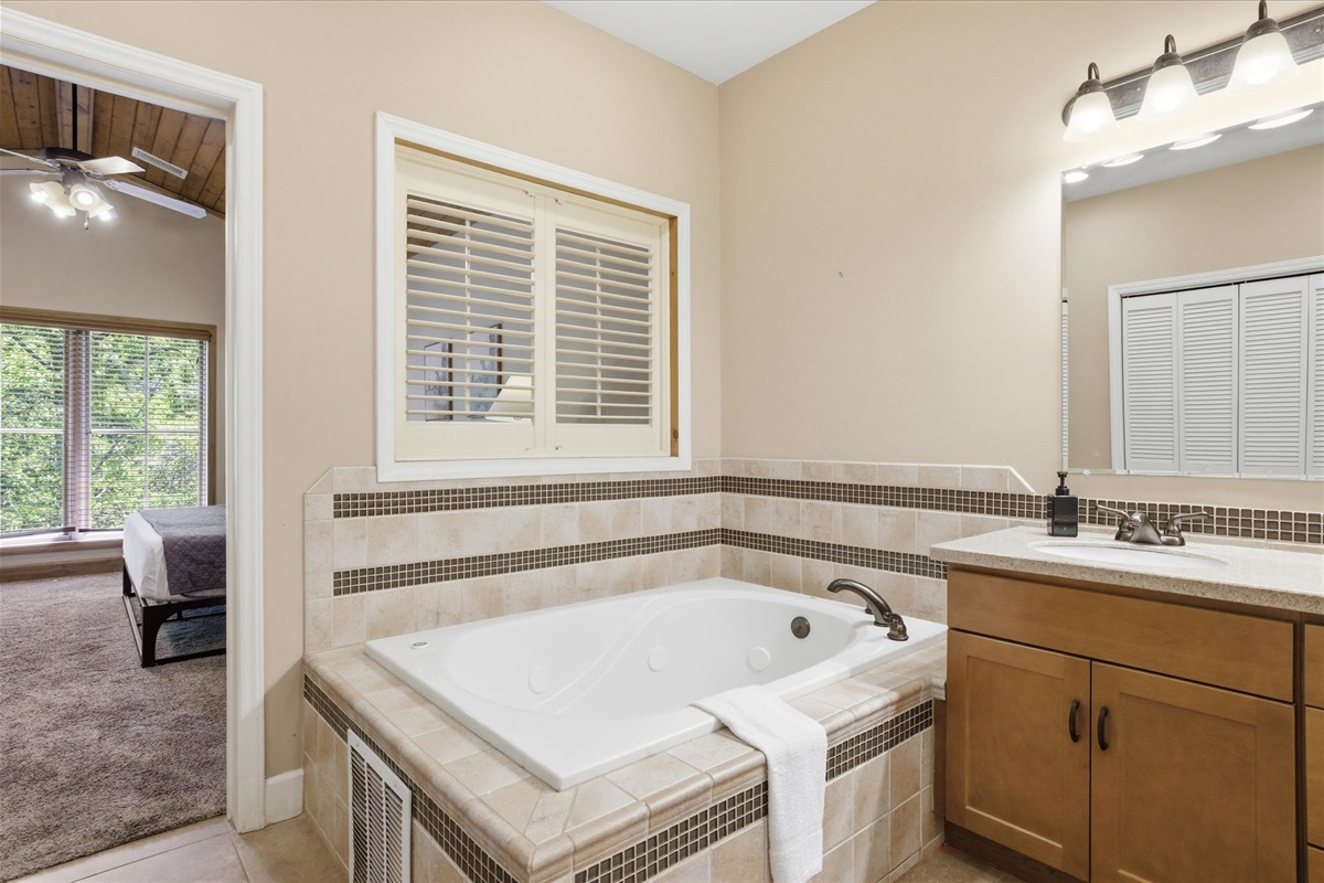 Settle into a slower pace in Unit 322’s master bathroom, with a spacious layout that makes getting ready feel easy and comfortable.