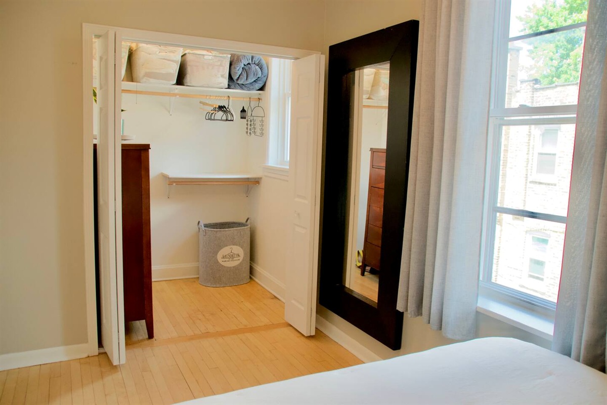Bright and spacious bedroom with plenty of closet space.