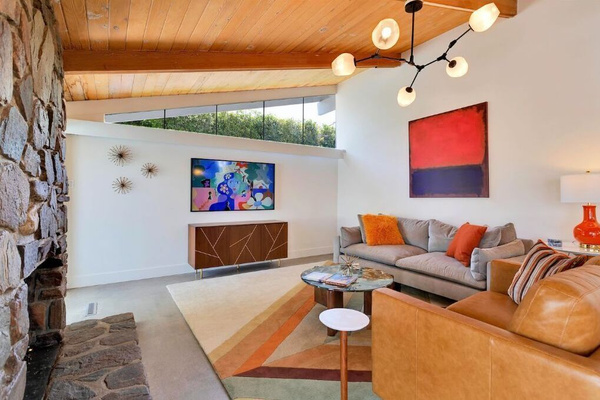 Great room with polished concrete floors and a gas fireplace