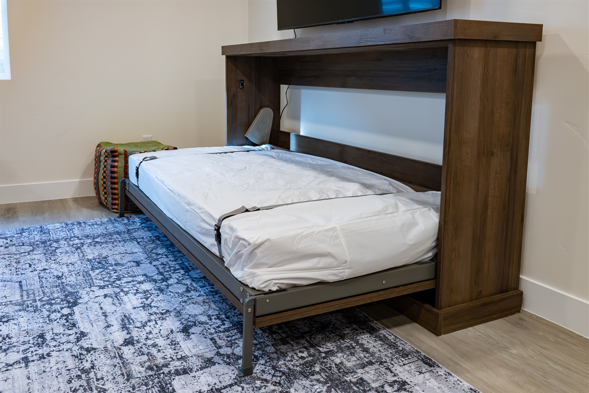 Convenient Murphy bed offering extra sleeping space without sacrificing room.