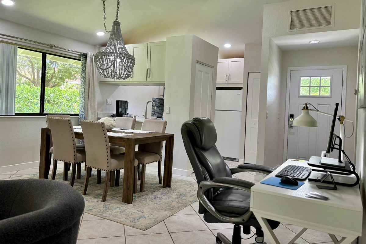 The office work desk is located in the general are between the living room and dining area. A comfortable desk chair and monitor gives you a great place to get work done if needed.