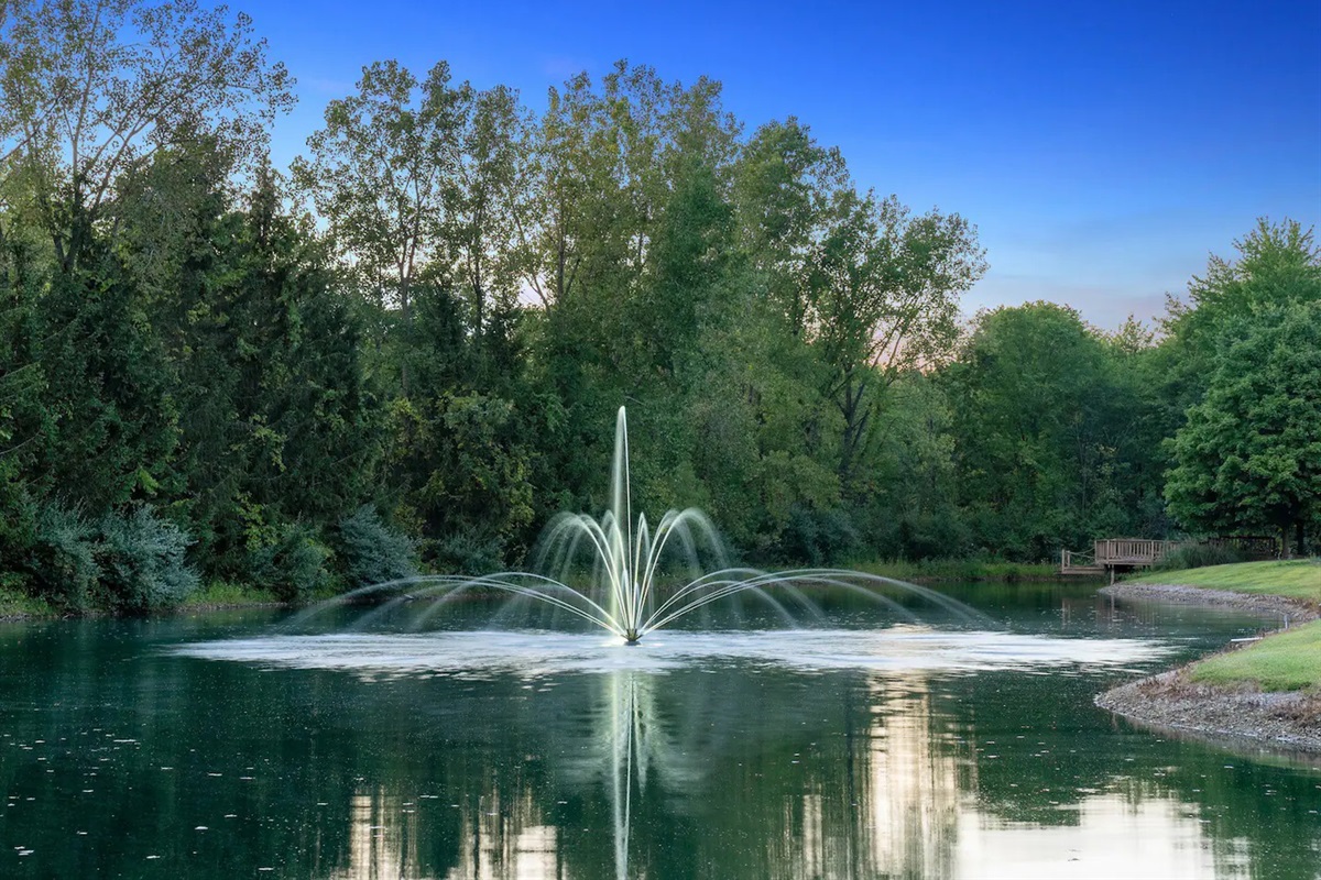The lake&rsquo;s stunning fountain creates a tranquil ambiance in the private pond 
