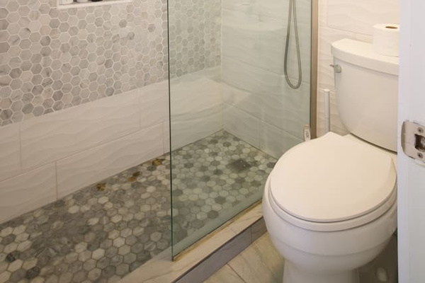 Remodeled bathroom with walk in shower and rain shower head
