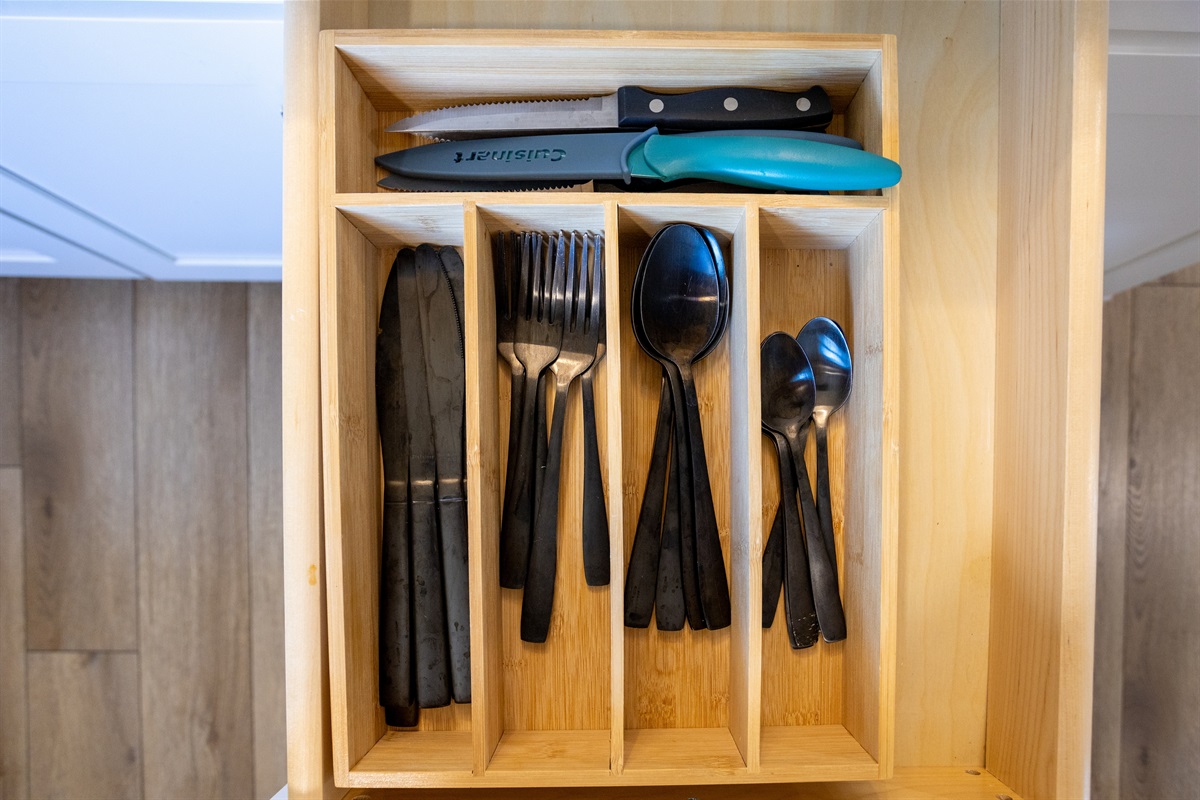 Find every utensil you need neatly organized and ready for your next meal.