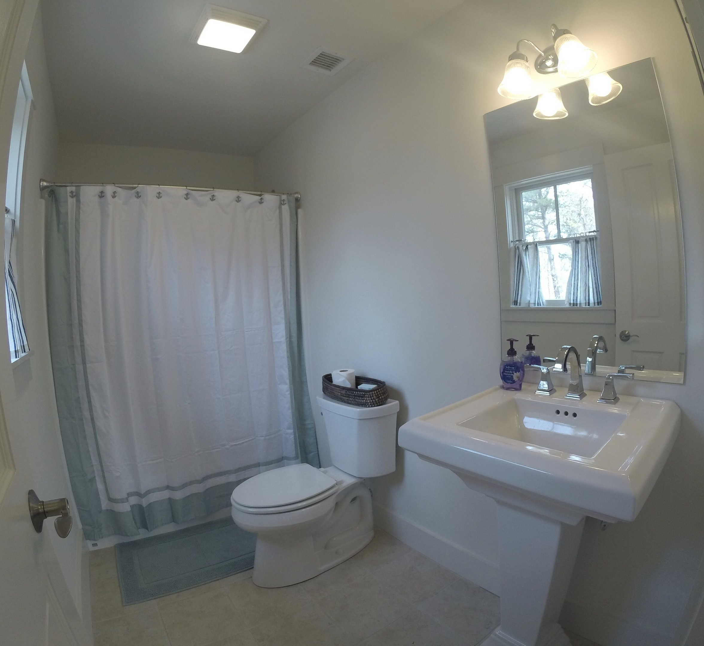 Bathroom off of purple guest room.