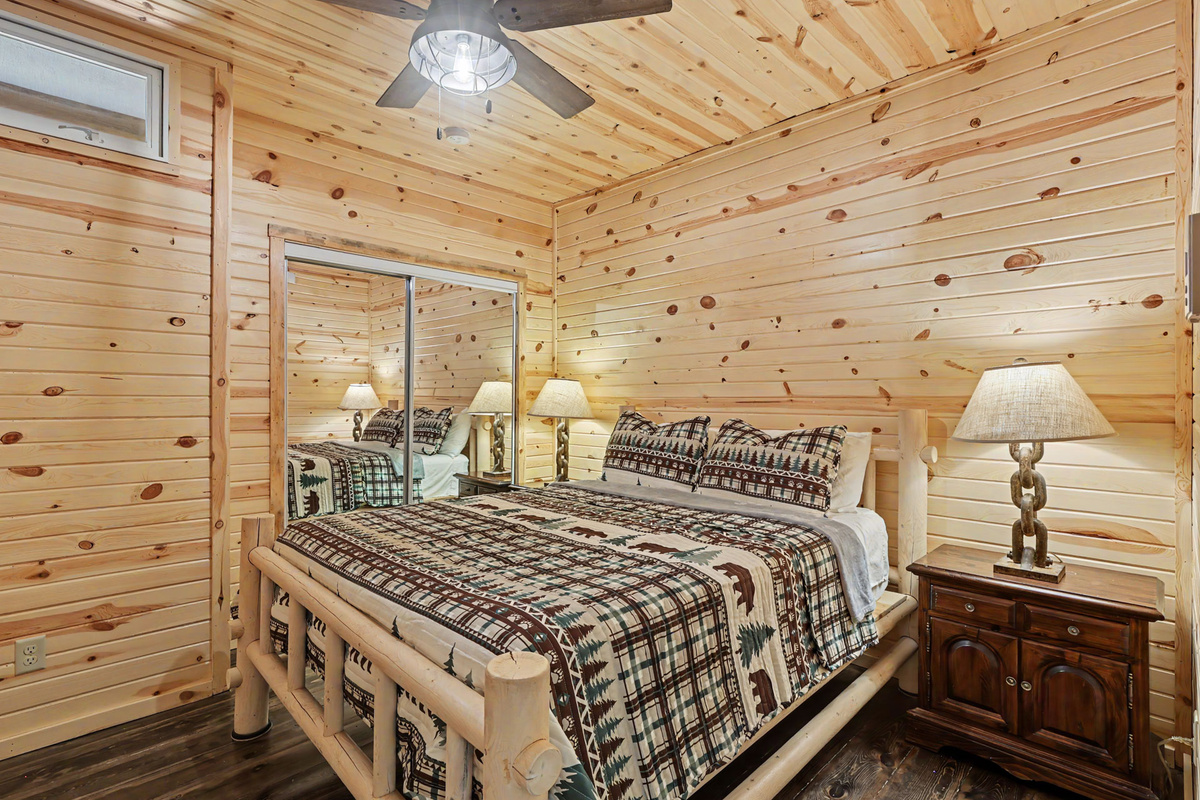 Famly Room Queen Bedroom with Wood Accent Walls
