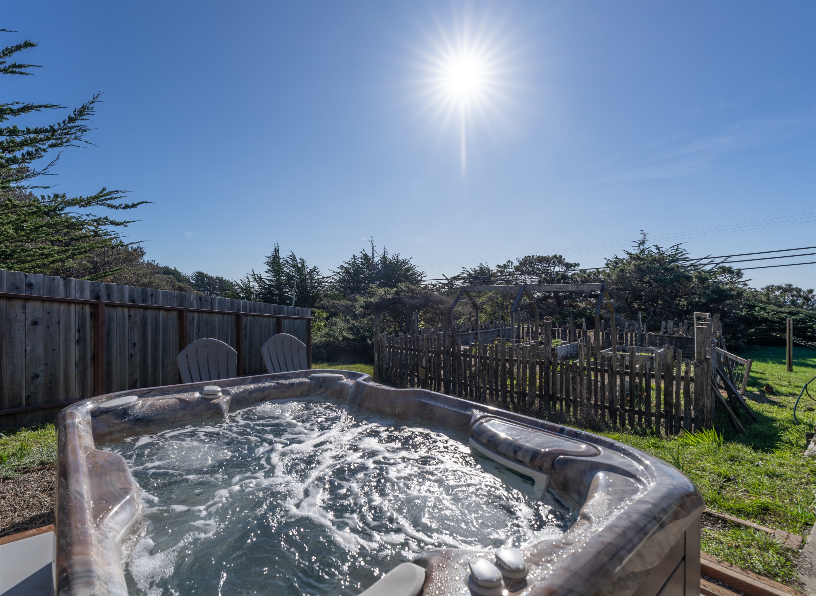 The private, secluded ocean-view hot tub is reserved only for you, tucked away from public view. The hot tub uses salt as a sanitizer and is serviced after each guest's stay.