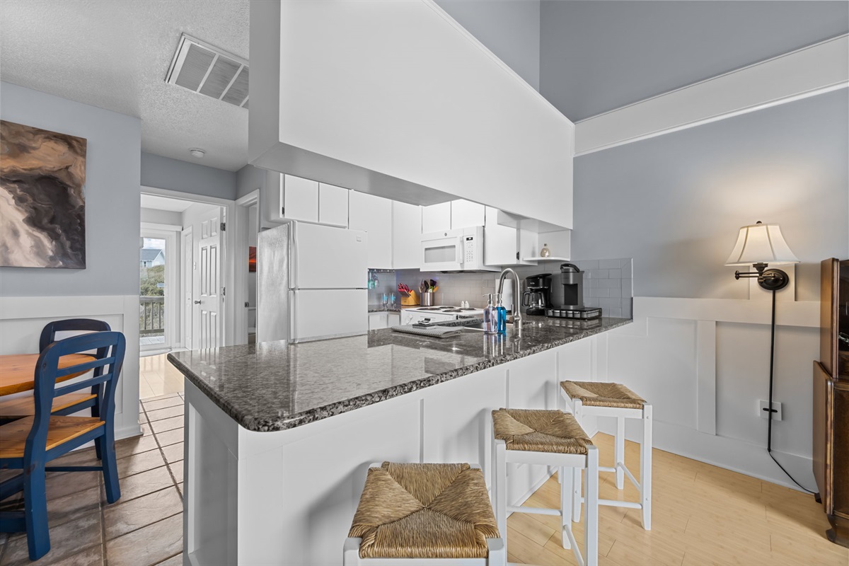 Open kitchen with bar seating: simple, clean, inviting