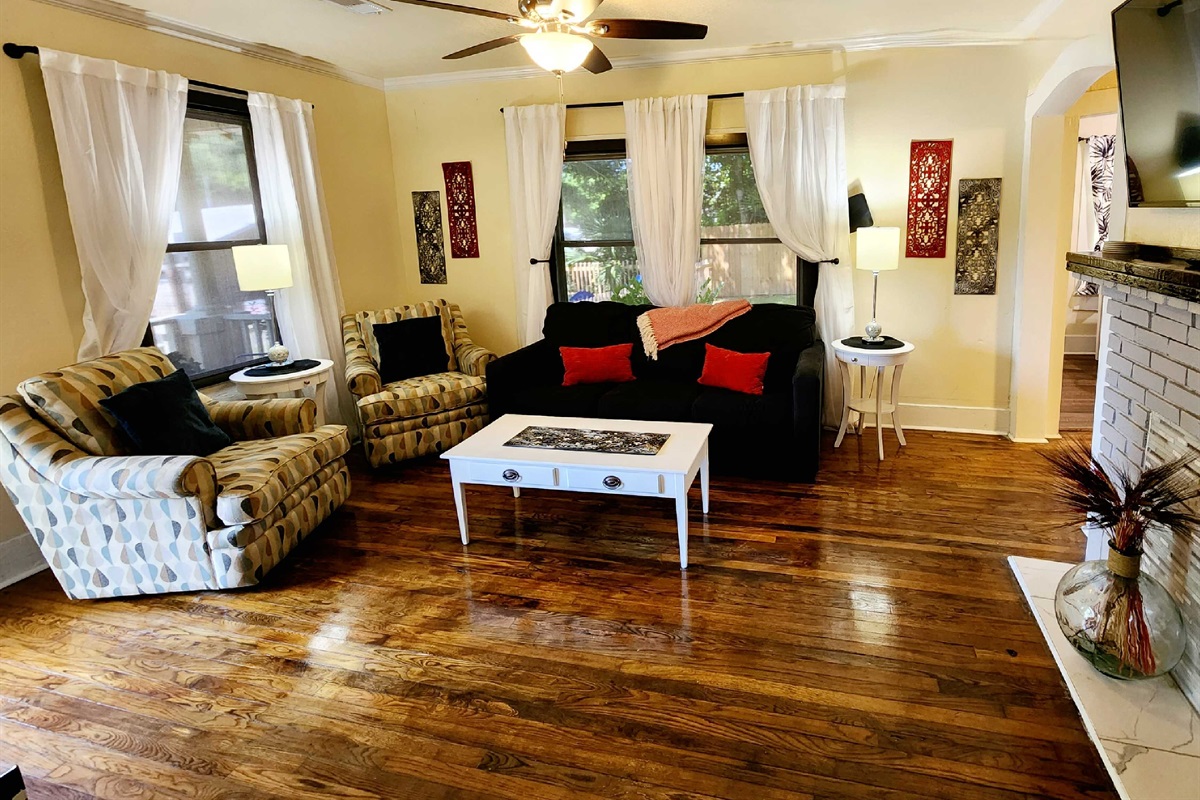 Living room - 55" tv, new sleeper sofa and chairs