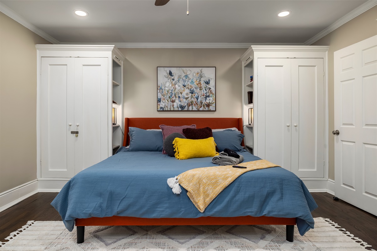 Welcome to your personal oasis: The front view of the king suite exudes a cozy and vibrant charm, inviting guests into a space where comfort meets style, ensuring an exquisite stay from the ve