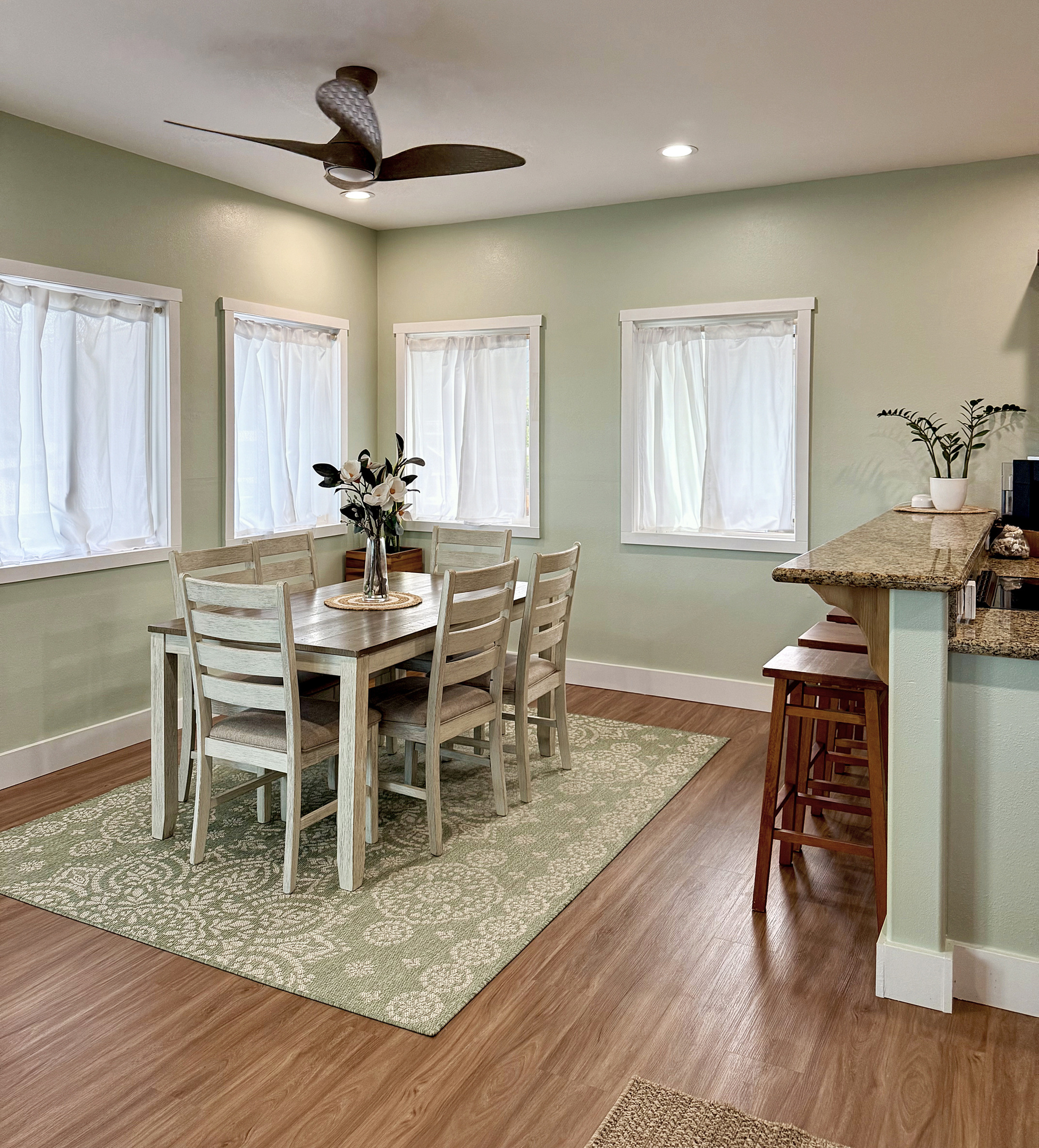 Dining Area | Representative Interior. Finishes, decor, and furniture, vary by duplex unit.