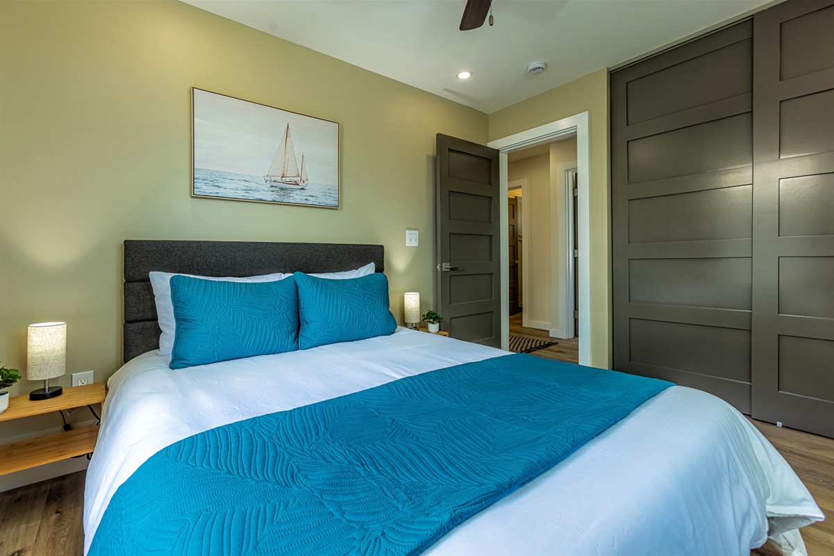 1 of 3 Bedrooms: Queen Bed, Ceiling Fan and AC