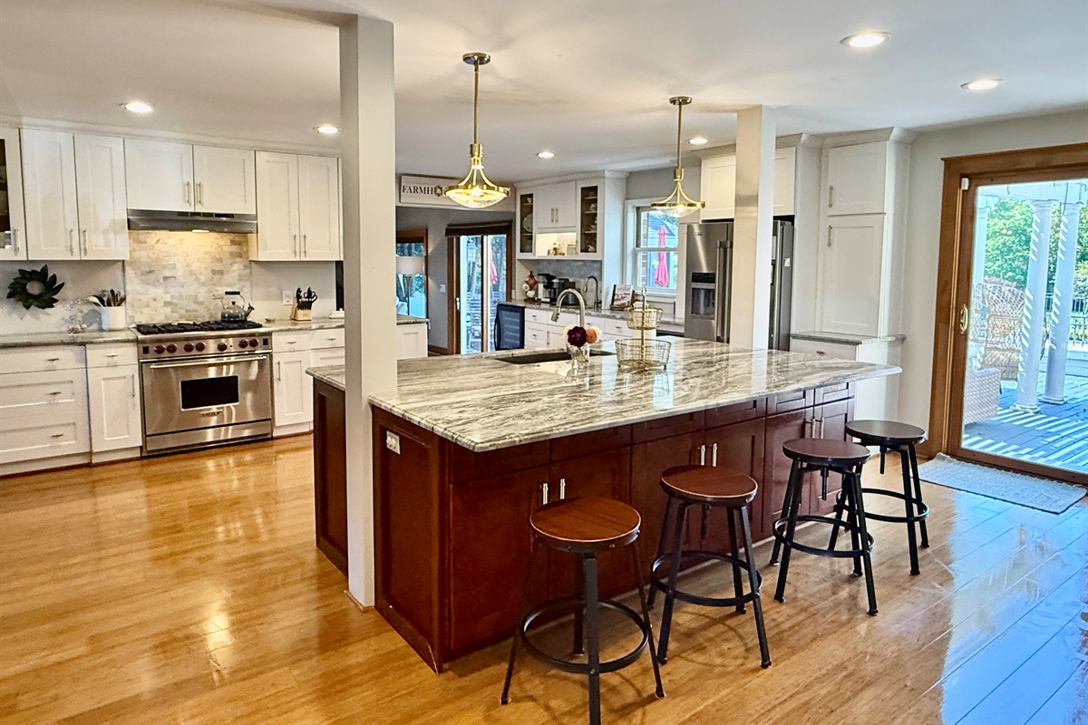 HUGE kitchen. Seating for 14. 3 Ovens and PLENTY of Space!