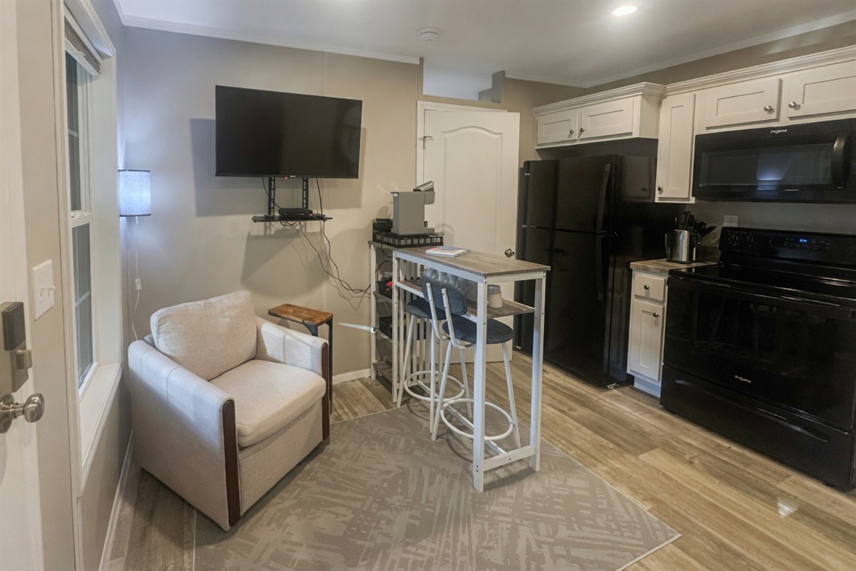 Smart tv with dvd player and dining area in living room