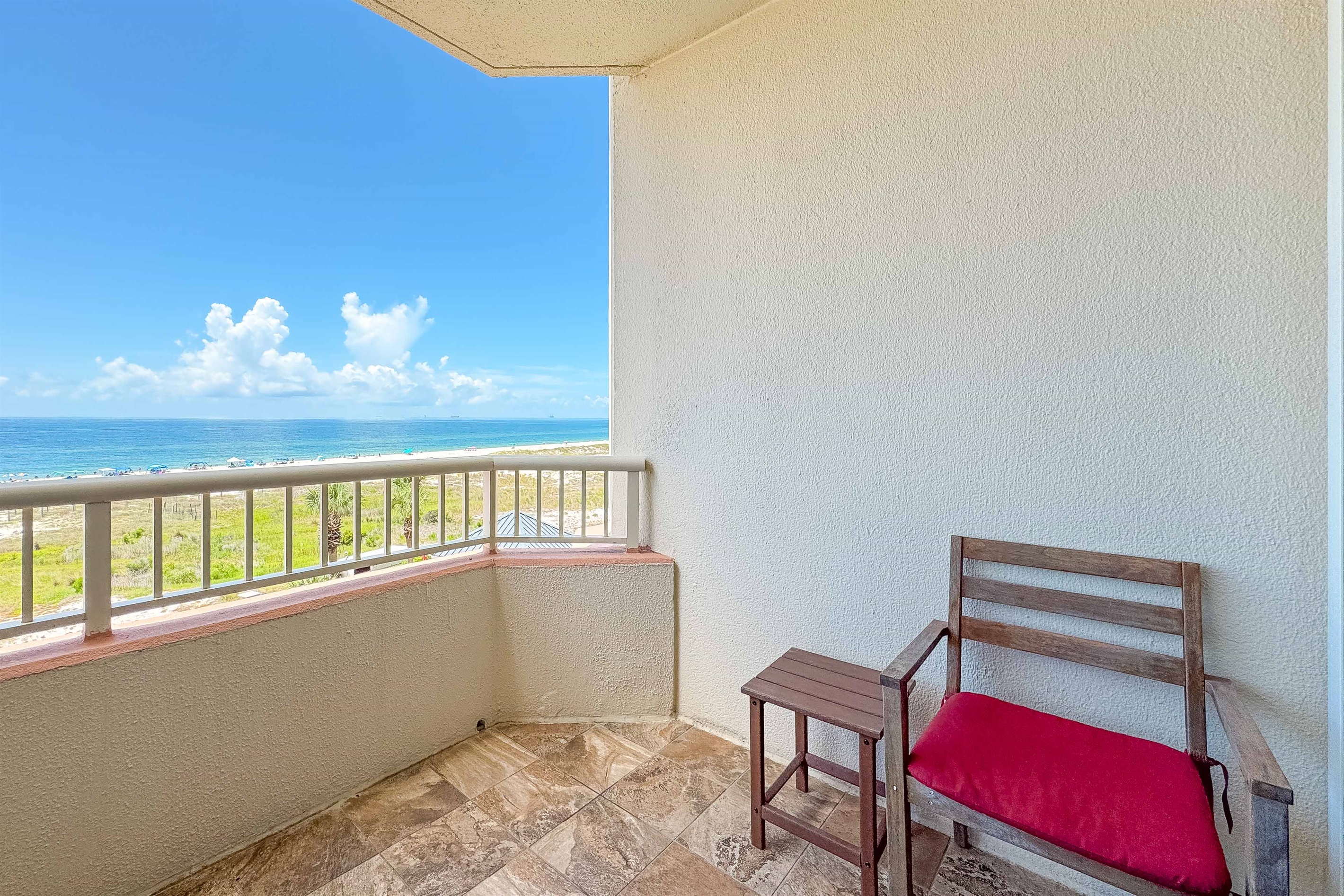 Direct oceanfront balcony offering stunning views and seamless indoor-outdoor living.  A true coastal retreat.