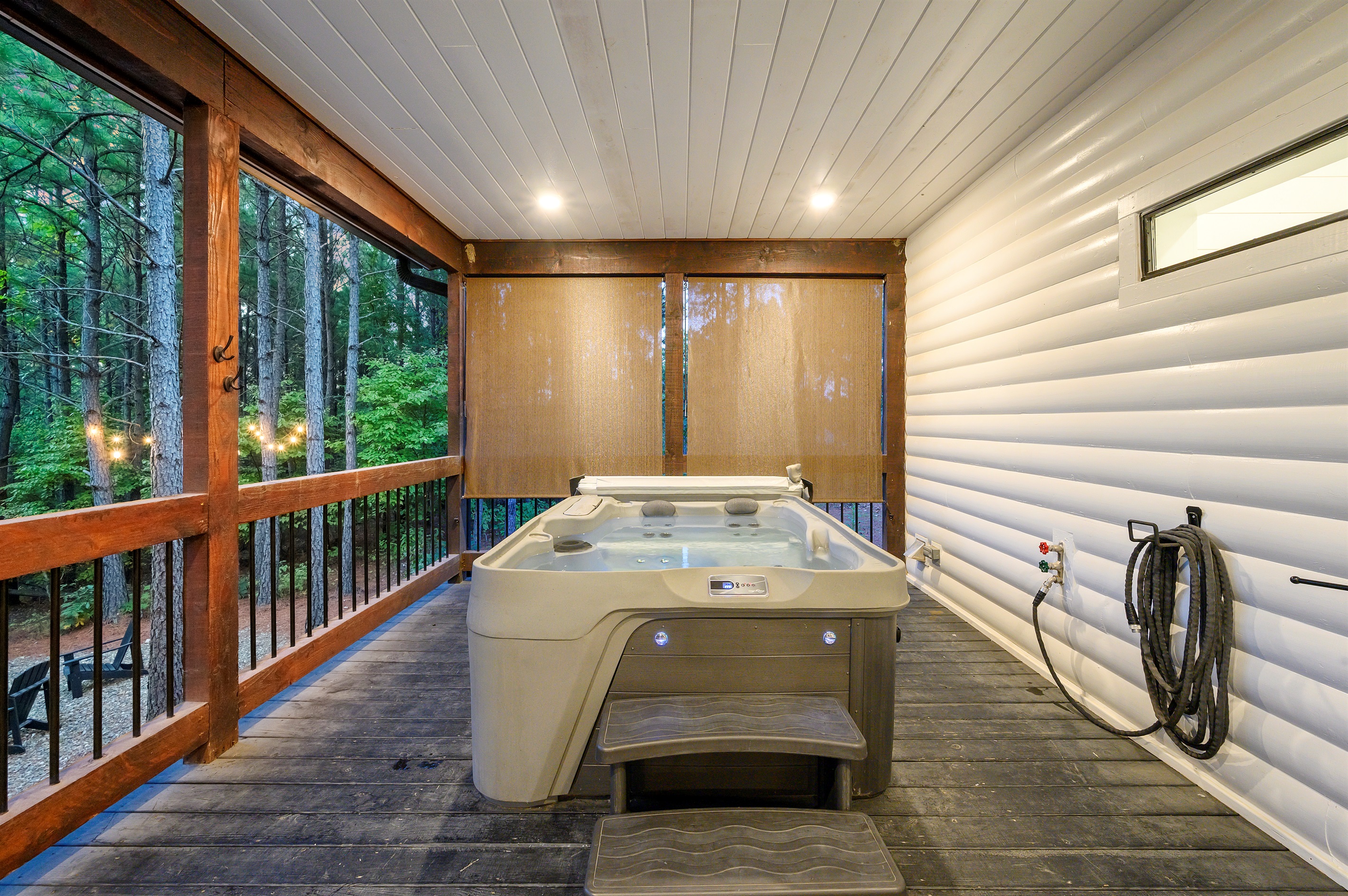 Complete & total privacy. Tucked in the corner of your spacious deck with those serene forest views.