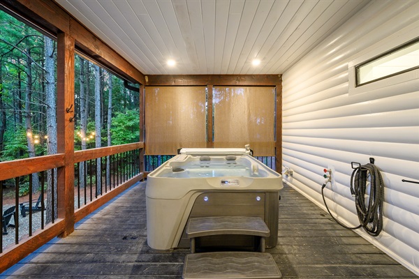 Complete & total privacy. Tucked in the corner of your spacious deck with those serene forest views.
