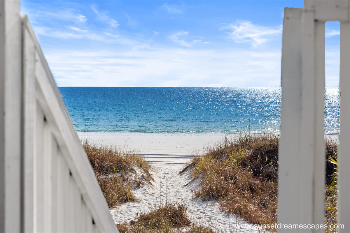 Only a few sandy steps to reach the sugar sand beaches of the Emerald Coast. Surfside Retreat is truly place to relax and recharge. An outdoor shower is pictured below which will help keep you and your gear sand-free after a fun-filled day at the beach.