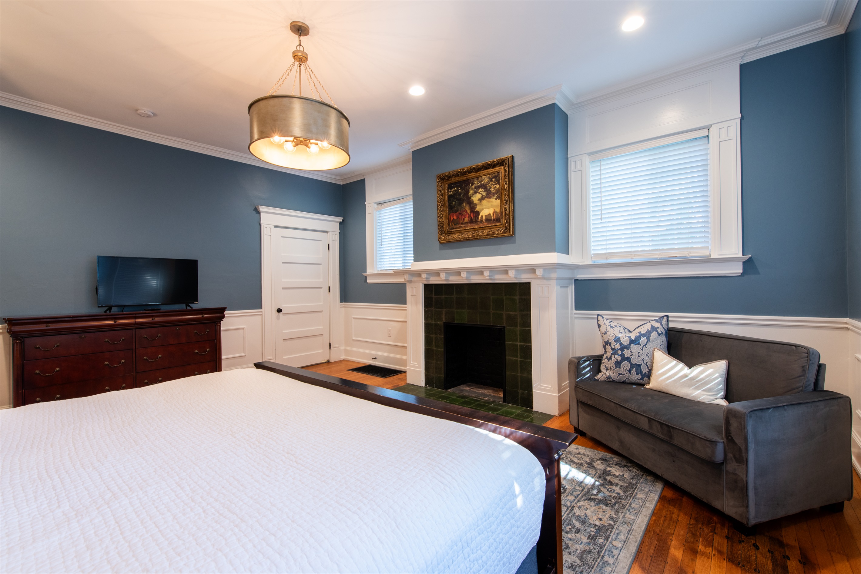 Primary Bedroom ~ 1st Floor ~ King Size Bed ~ Attached Renovated Full Bath ~ Walk in Closet ~ 50" Smart TV ~ Single Pull Out Sofa