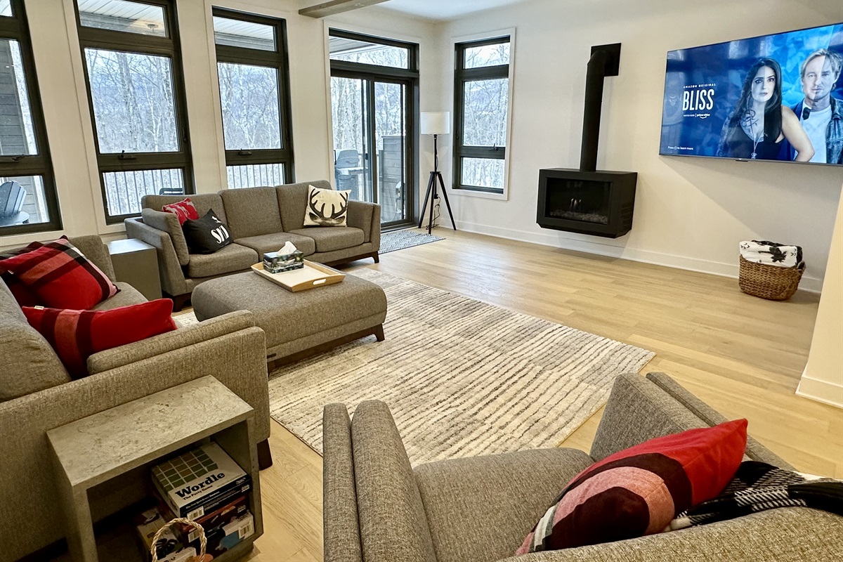 Living area with 75" SmartTV & Gas fireplace