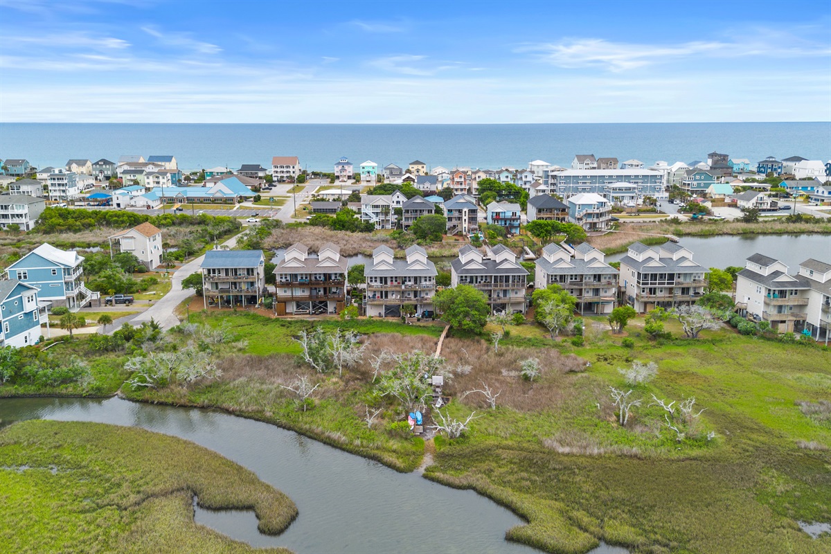 Peaceful marshfront setting with scenic water views right behind the home