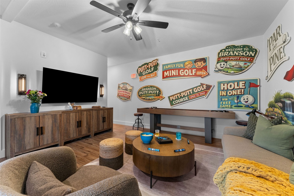 There's a huge TV and lounging area for watching movies, shows or just haning out. Oh, did we mention shuffleboard?