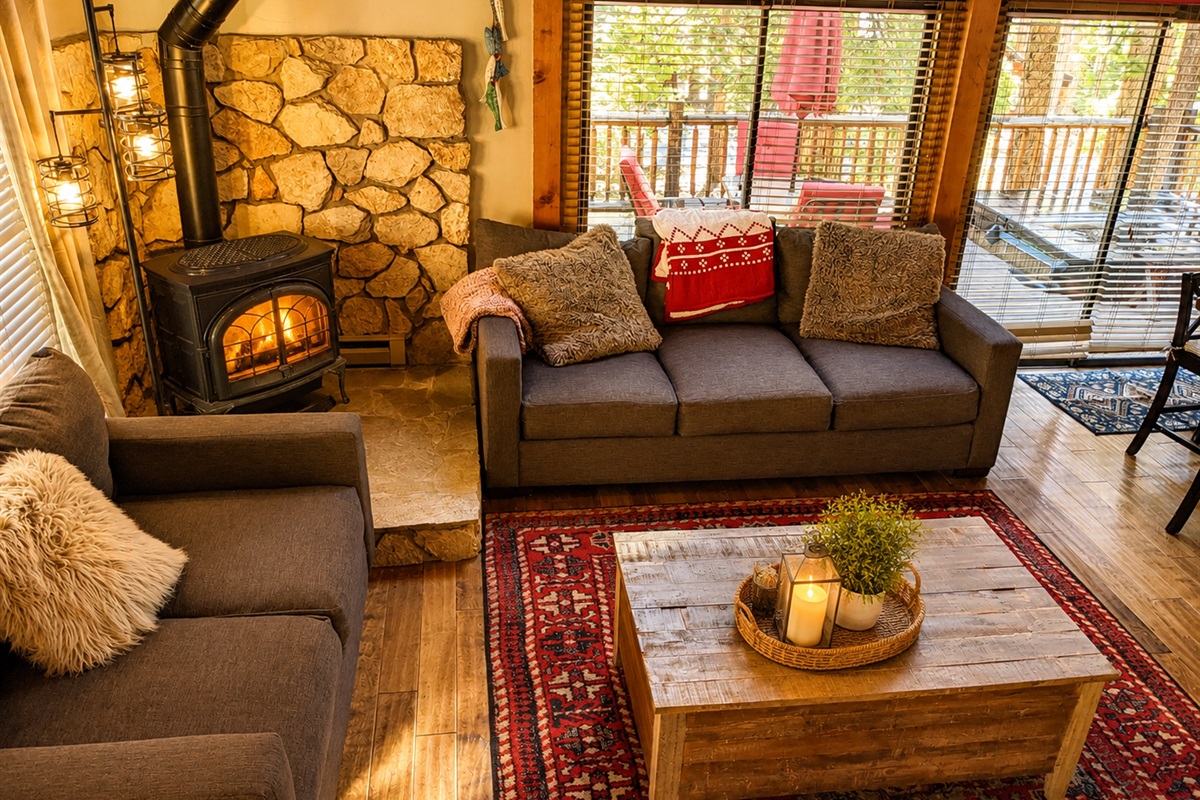 We have large, cozy couches in our living area and a gas stove heater in the corner.  We also have some board games and a tv for cozy nights in the "Baby" cabin.