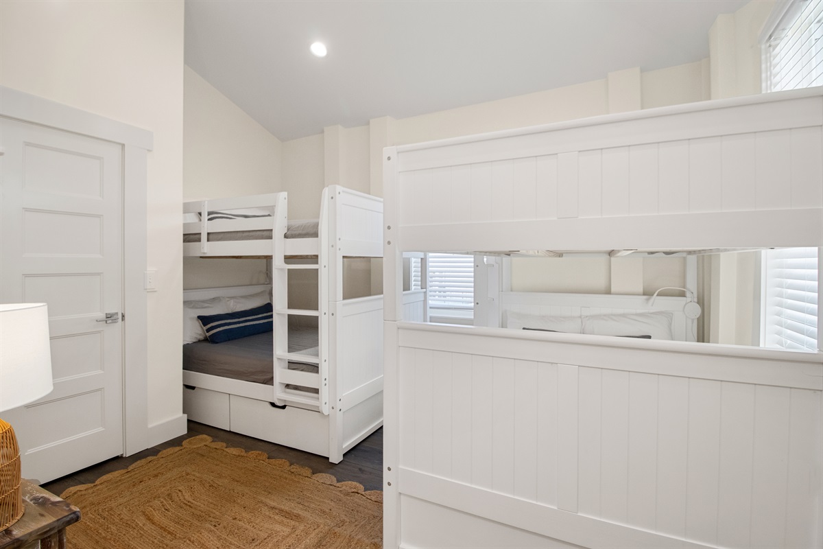 Drawers under the bunk beds + a closet provides ample storage space