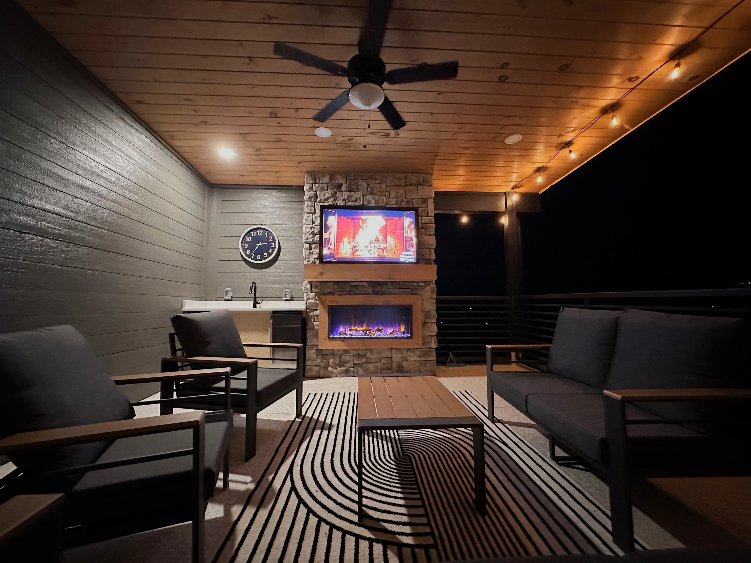 Floor 4 - Rooftop Deck: Fireplace + Movie Area