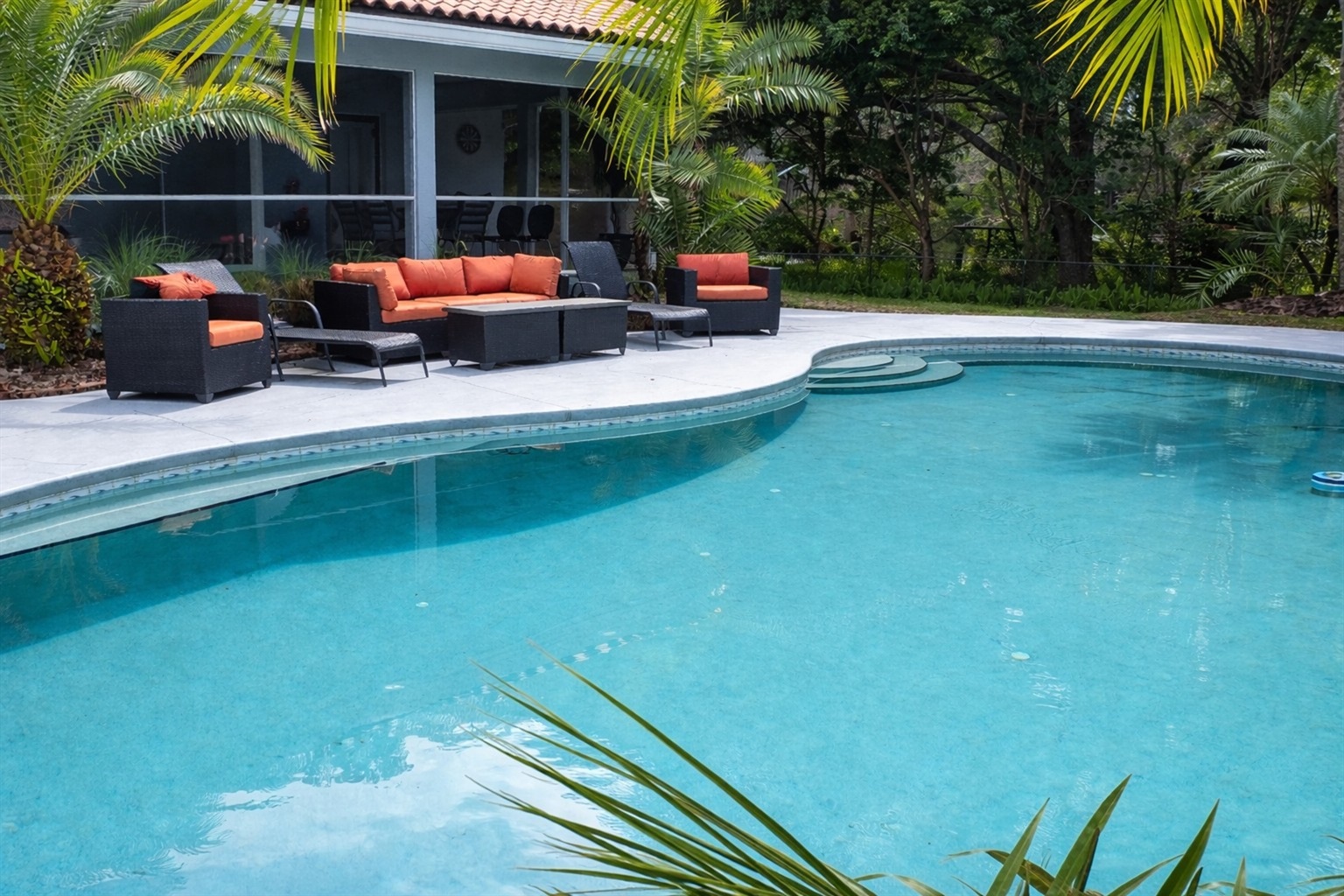 Sunset Cove Elegant Tropical Pool area
