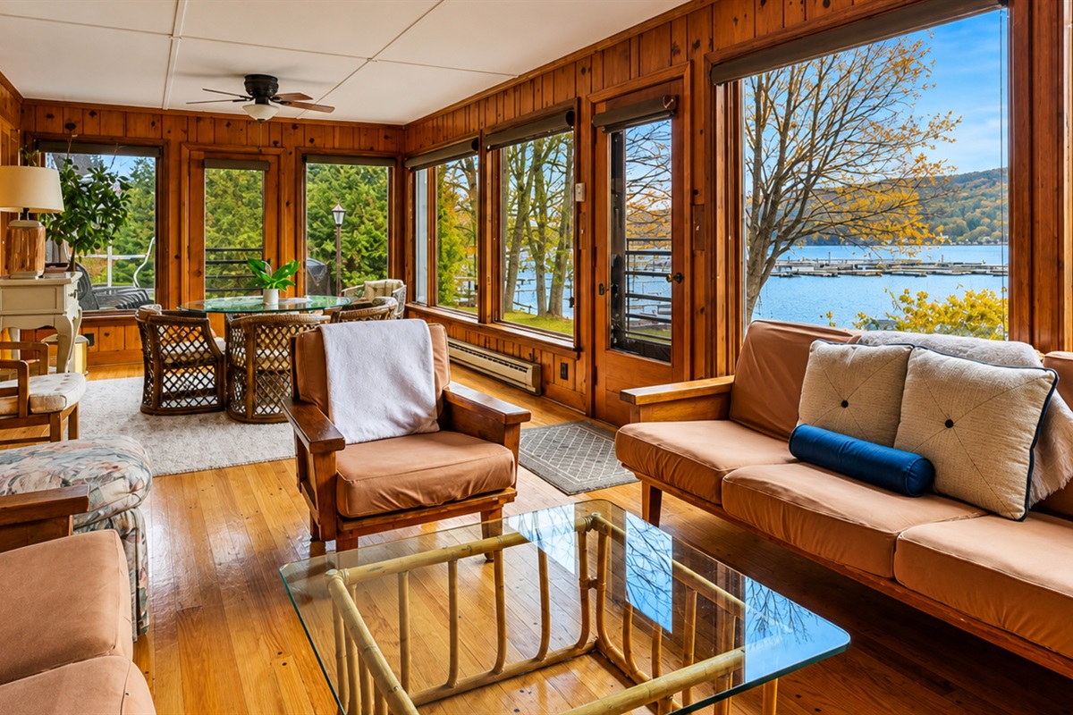 Cozy sun room for morning coffee or evening wine with beautiful views of the lake
