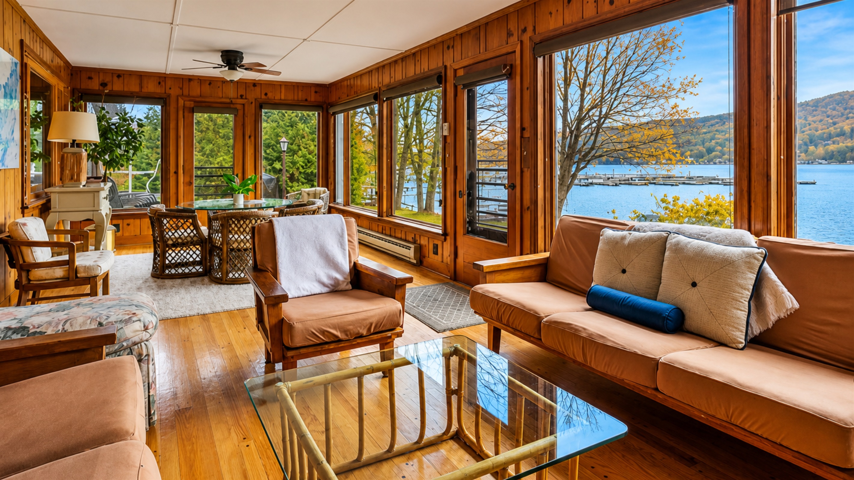 Cozy sun room for morning coffee or evening wine with beautiful views of the lake