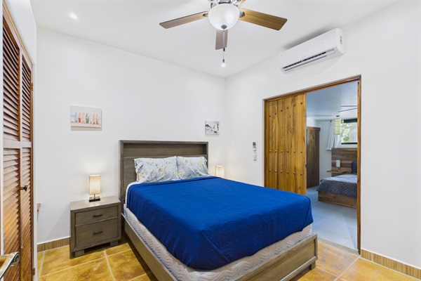 Bedroom 2 queen size bed.  This bedroom is completely private with it's own entrance off den.  It also has double doors leading to bedroom 3 that can be locked for privacy.  There is a separate private entrance to bedroom 3 from the outdoor covered rancho.