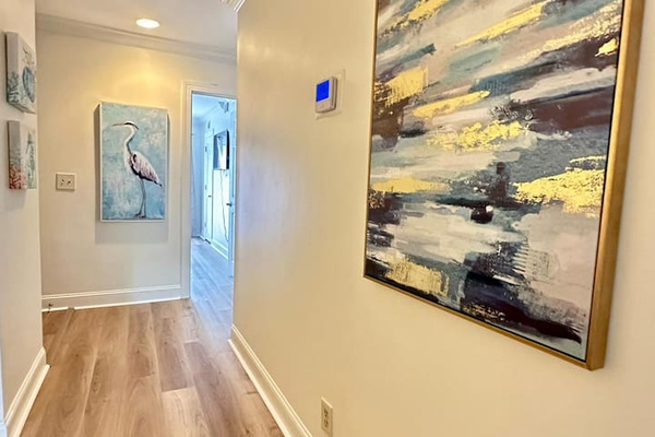 Hallway with coastal art